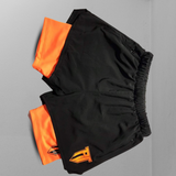 Orange and Black. Men’s clothing and women’s clothing. People who play basketball, football, the NBA or the NBL wear this. Sportwear brand made for you. The PT 1 Apparel brand which is we can name a top sportswear brand. This is a sportswear essential collection or essentials collection. Popular sportswear shorts, with a beautiful theme. Best fit for gymming, outdoor activities, and hiking. Another option other than Nike, Adidas, puma or Markham.