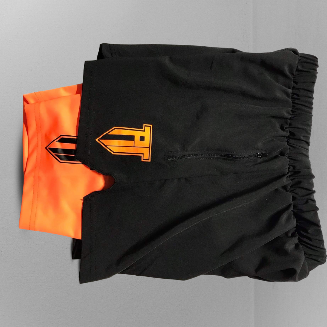 Orange and Black. Men’s clothing and women’s clothing. People who play basketball, football, the NBA or the NBL wear this. Sportwear brand made for you. The PT 1 Apparel brand which is we can name a top sportswear brand. This is a sportswear essential collection or essentials collection. Popular sportswear shorts, with a beautiful theme. Best fit for gymming, outdoor activities, and hiking. Another option other than Nike, Adidas, puma or Markham.